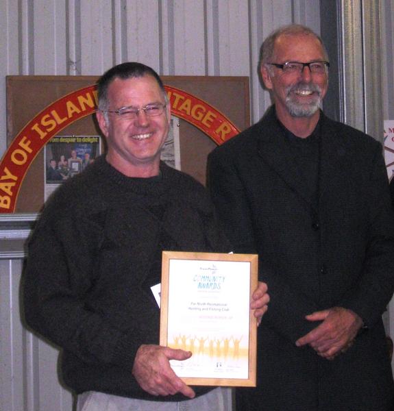 William recieving a Trustpower community award for conservation as President of the Far North Hunting and fishing club this year presented by Far north mayor, Wayne Brown.